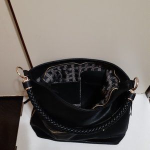 ladies black leather tote with gold zippers